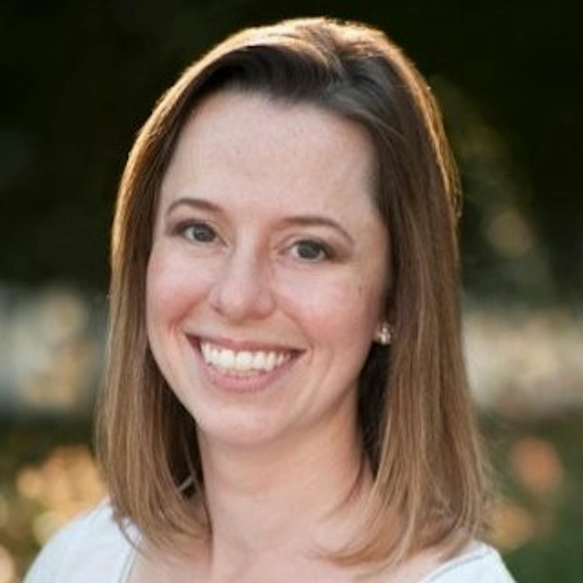 a person smiling for the camera